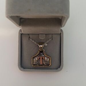 Vintage-Inspired Gold and Silver Pendant Necklace